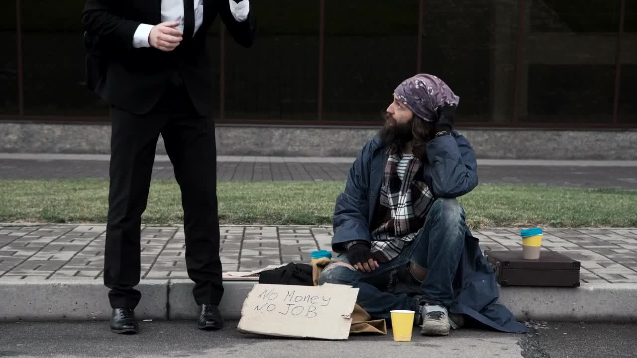 Stock Video Business Man And Beggar Sitting On The Street Live Wallpaper For PC