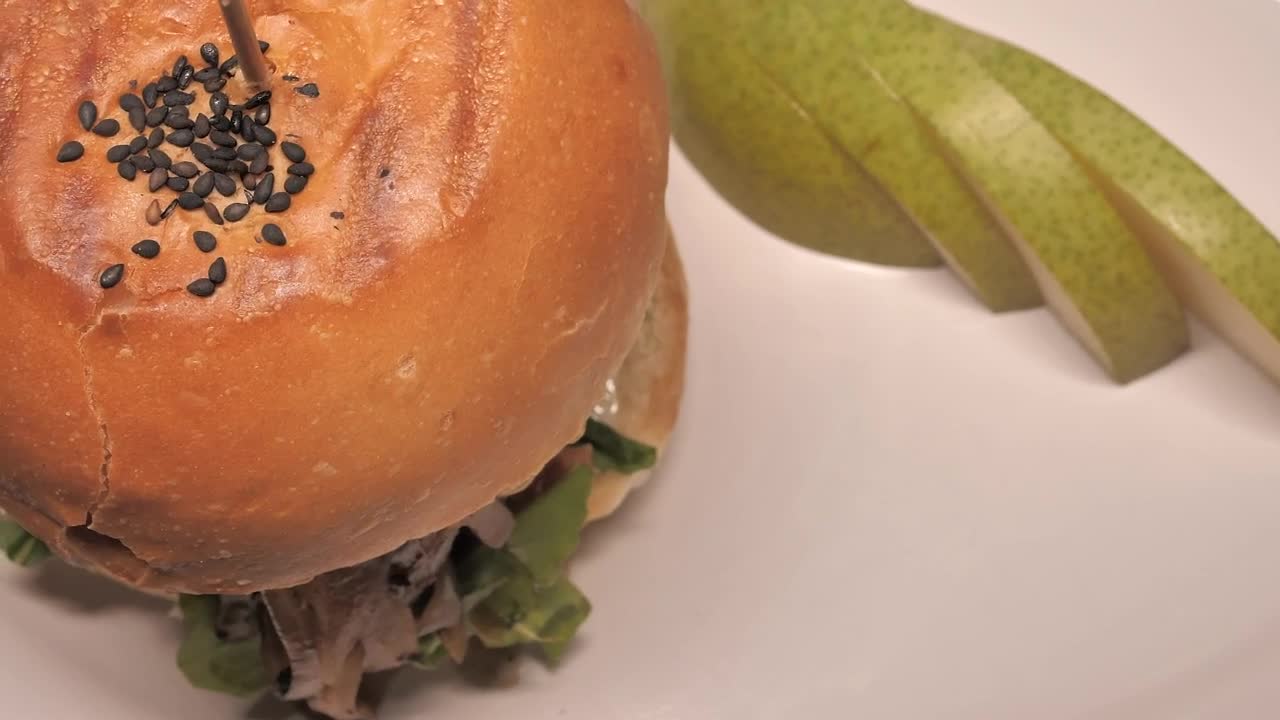 Stock Video Burger And A Sliced Pear On A Plate Live Wallpaper For PC