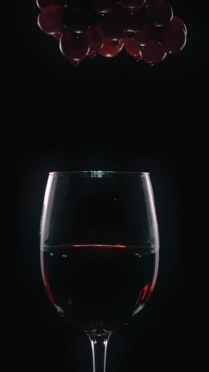 Stock Video Bunch Of Grapes Dripping Wine Into A Glass Live Wallpaper For PC
