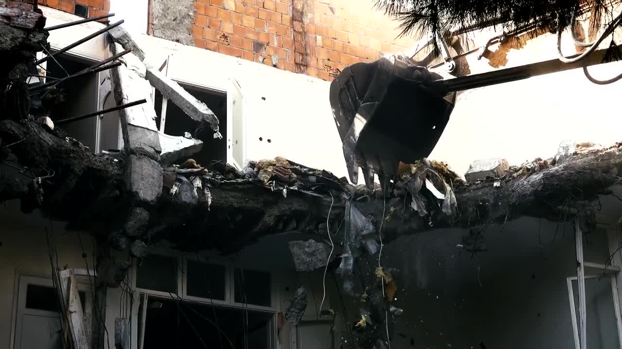 Stock Video Bulldozer Knocking Down A Ruined Building Live Wallpaper For PC
