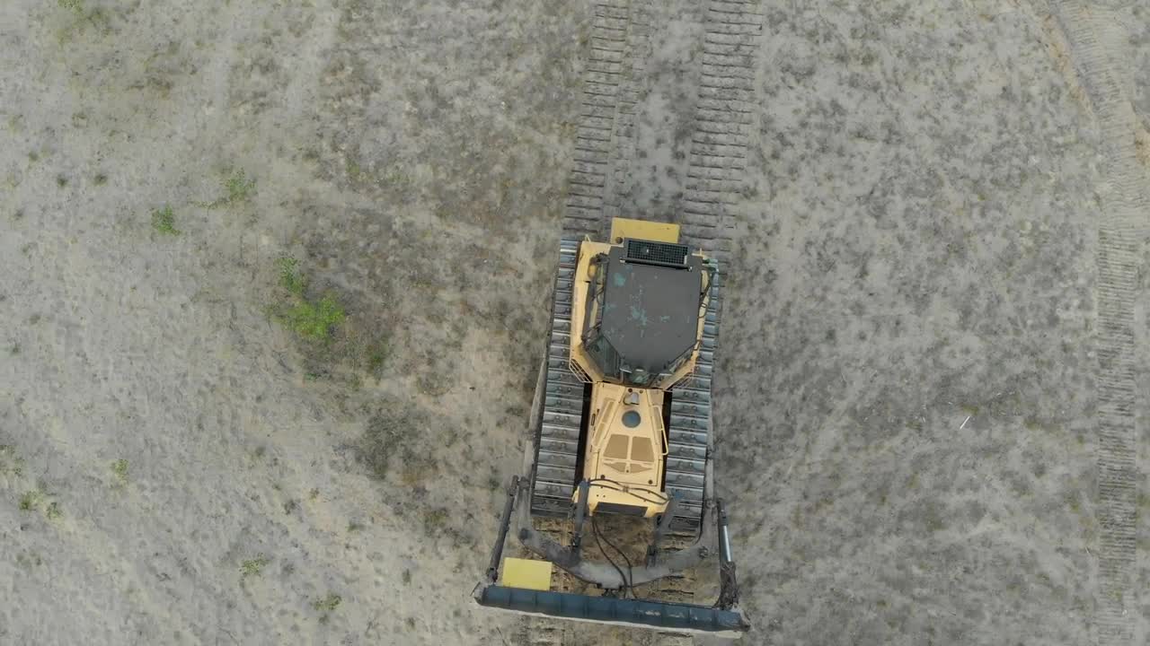 Stock Video Bulldozer Driving Through A Dirt Field Live Wallpaper For PC