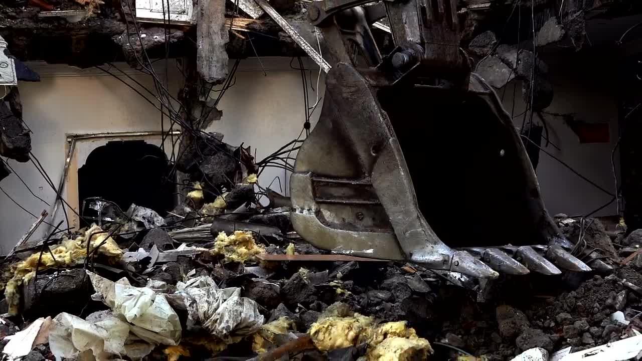 Stock Video Bulldozer Destroying And Cleaning The Ruins Of A Building Live Wallpaper For PC