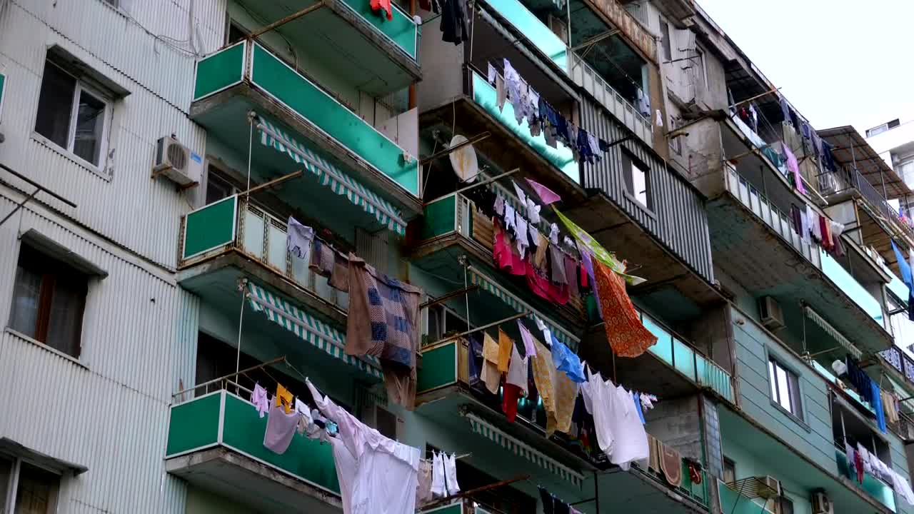 Stock Video Building With Clothes Hanging In The Balcony Live Wallpaper For PC