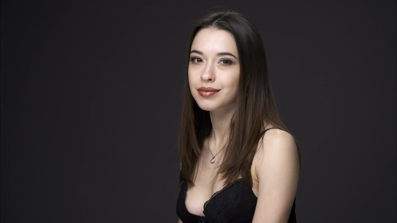 Stock Video Brunette Woman Looking At The Camera Live Wallpaper For PC