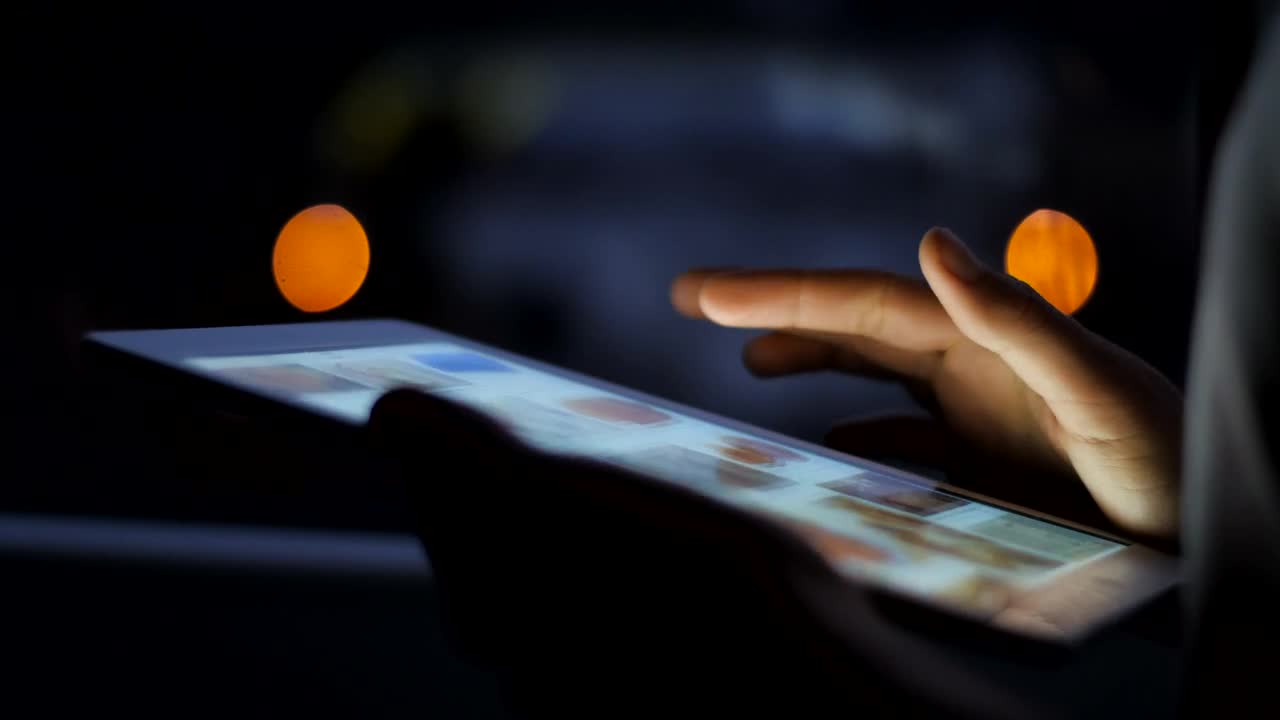 Stock Video Browsing The Web On A Tablet At Night Live Wallpaper For PC