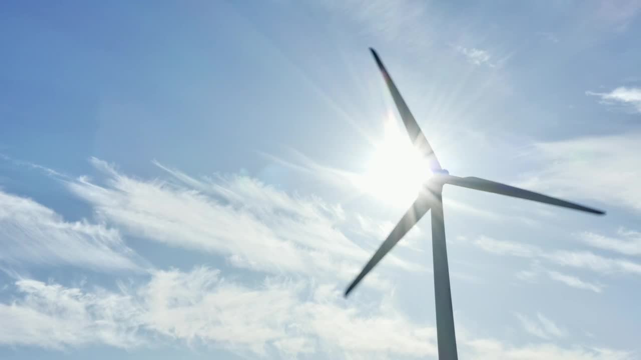 Stock Video Bright Sunshine Behind A Wind Turbine Live Wallpaper For PC