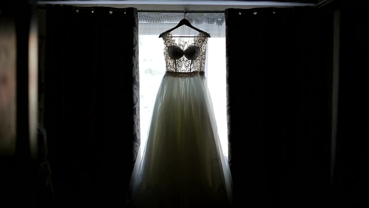 Stock Video Bride Admires Wedding Dress Hanging In Window Live Wallpaper For PC