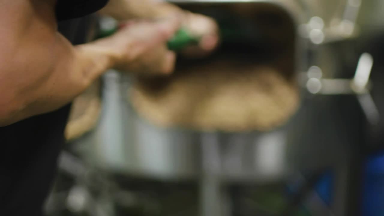Stock Video Brewer Taking Out Barley From A Tank Live Wallpaper For PC