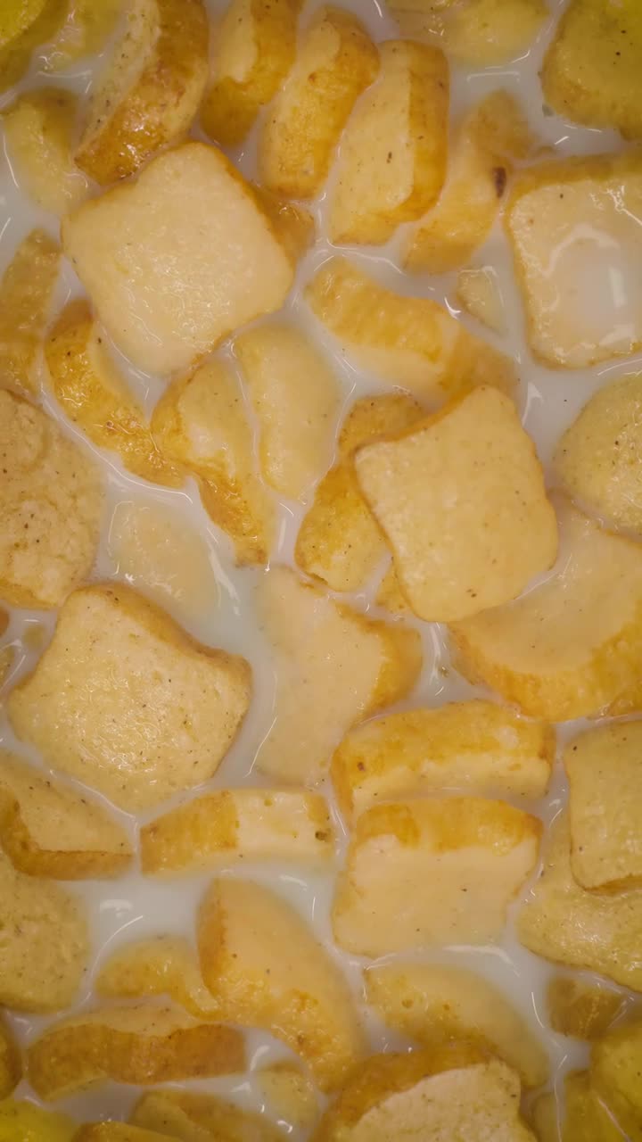 Stock Video Bread Shaped Cereal Texture In Bowl With Milk Live Wallpaper For PC