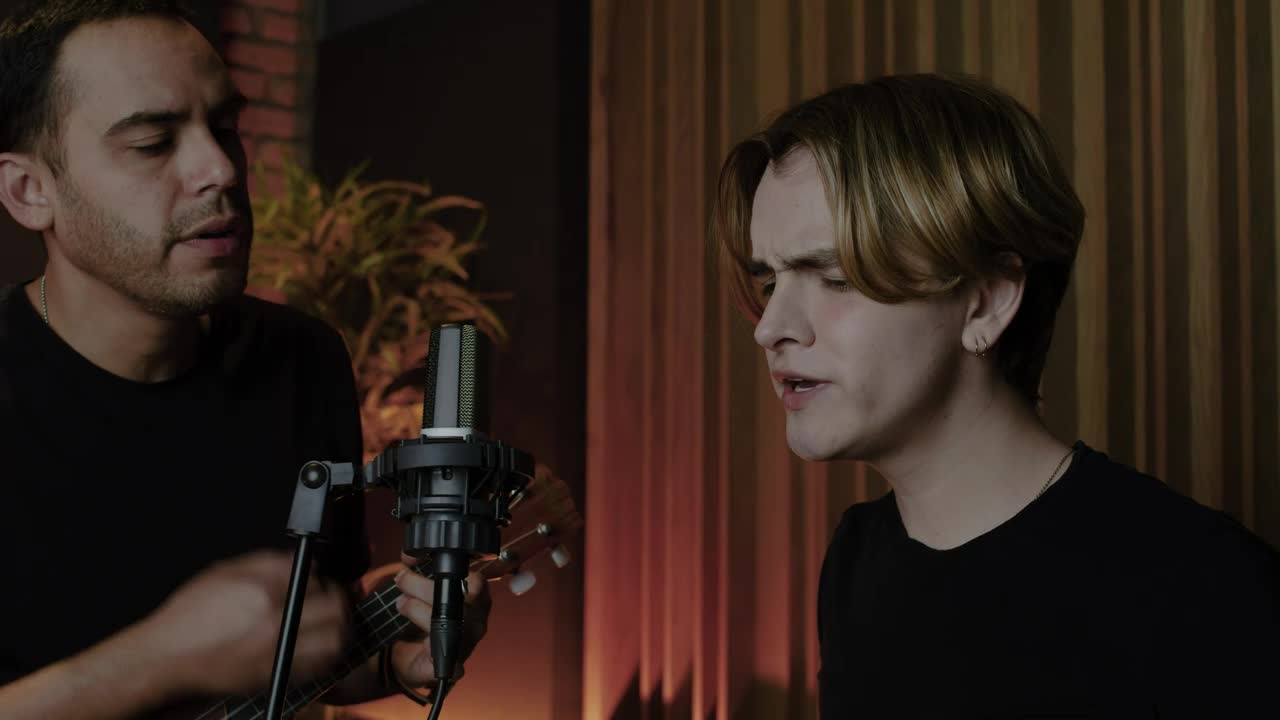 Stock Video Boys Singing In Front Of A Microphone Live Wallpaper For PC