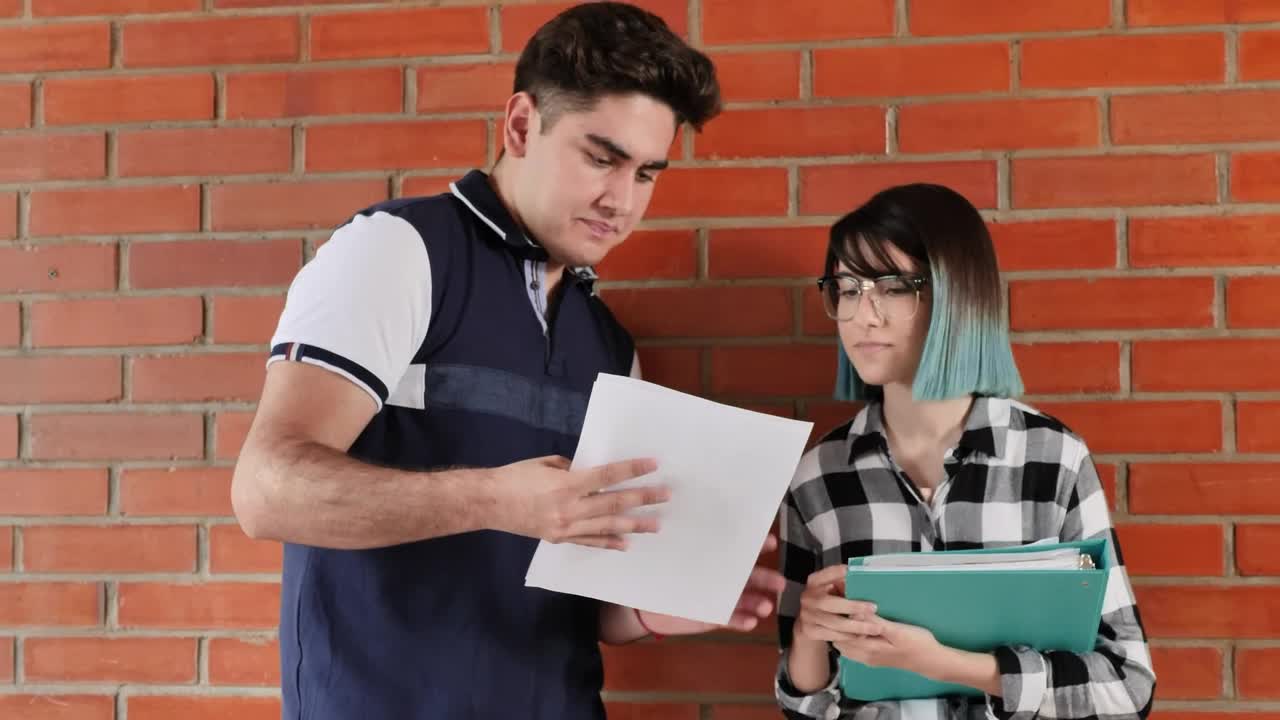 Stock Video Boys Man And Woman In A School Reviewing Information Live Wallpaper For PC