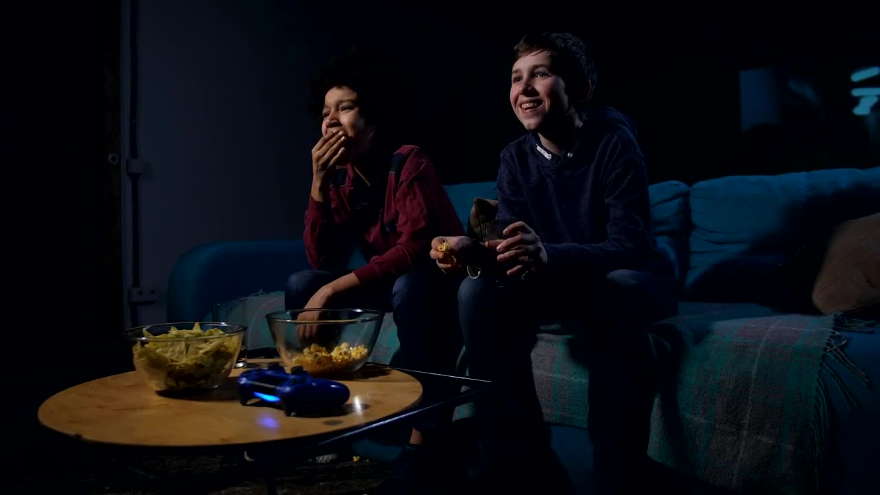 Stock Video Boys Laughing While Watching Tv Live Wallpaper For PC