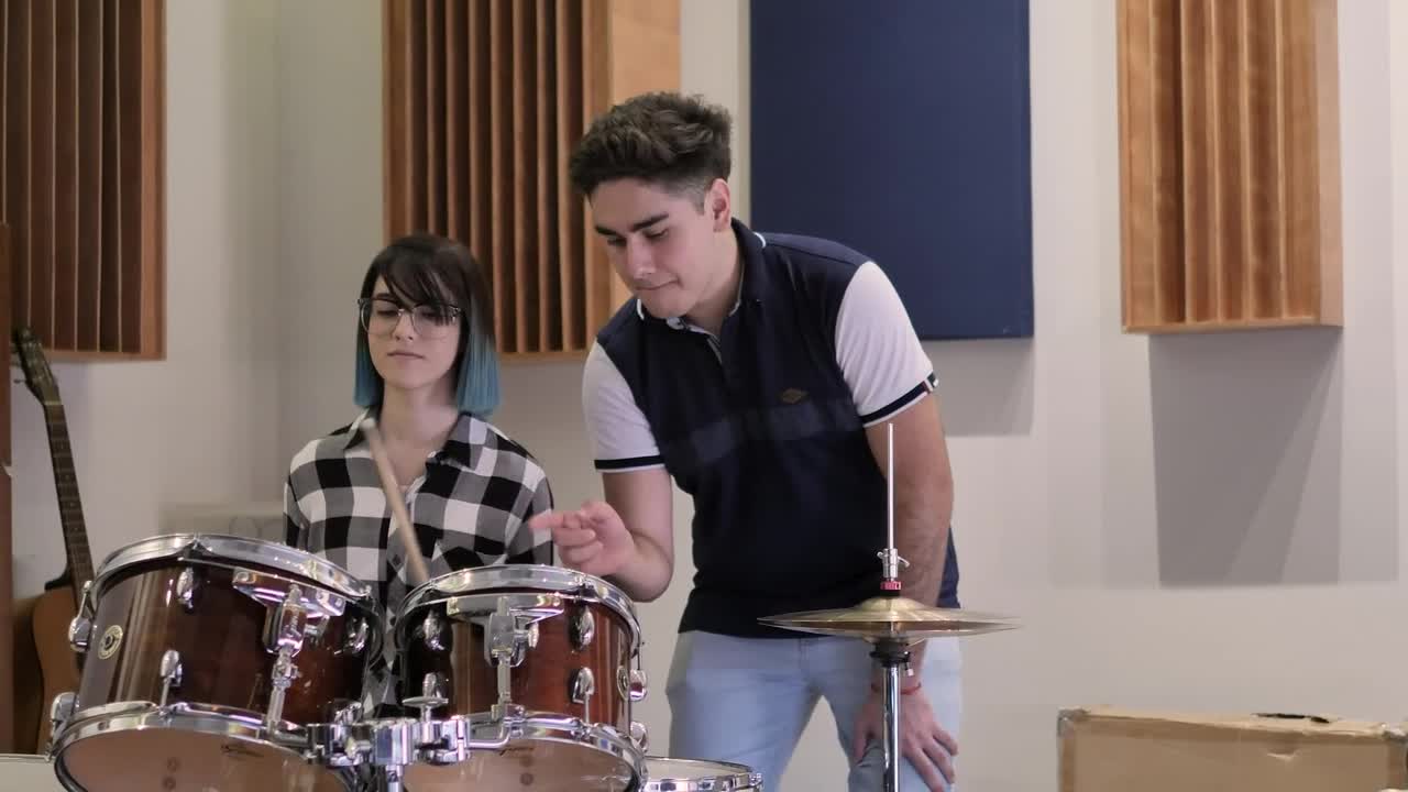 Stock Video Boy Teaching A Girl To Play Drums Live Wallpaper For PC