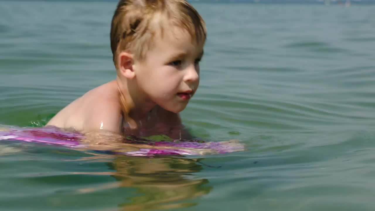Stock Video Boy Swimming With A Board Live Wallpaper For PC