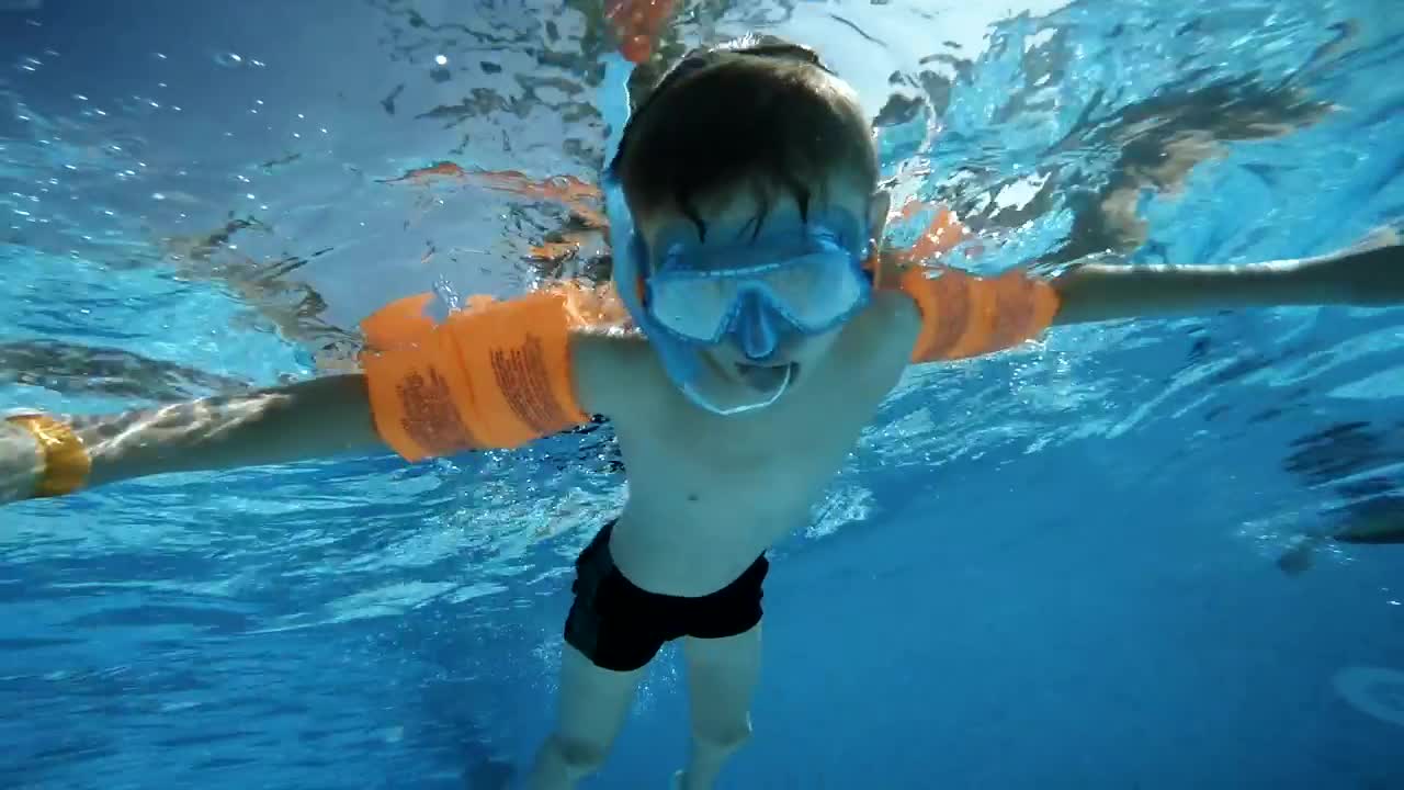 Stock Video Boy Swimming In The Pool And Saying Hi Live Wallpaper For PC