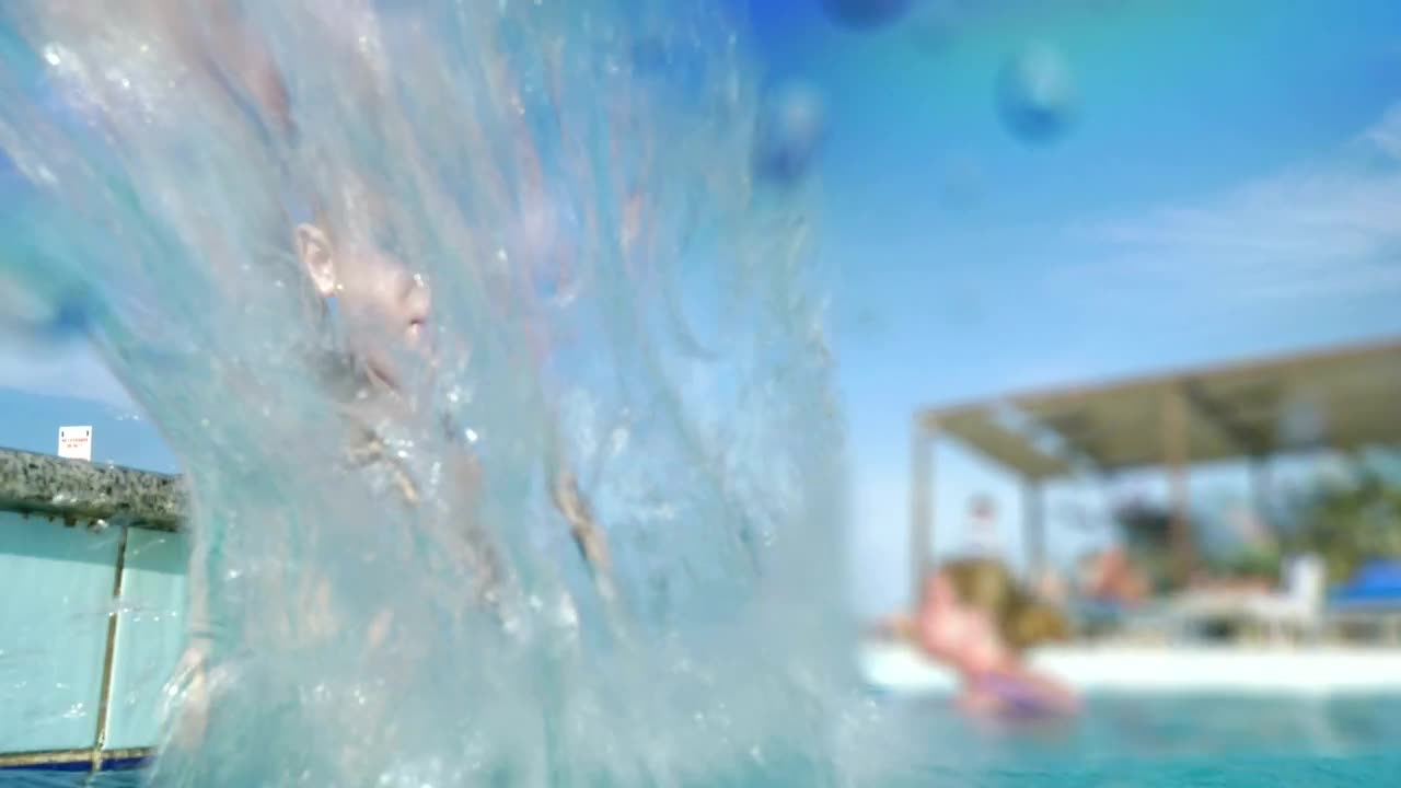 Stock Video Boy Splashing The Camera With Pool Water Live Wallpaper For PC