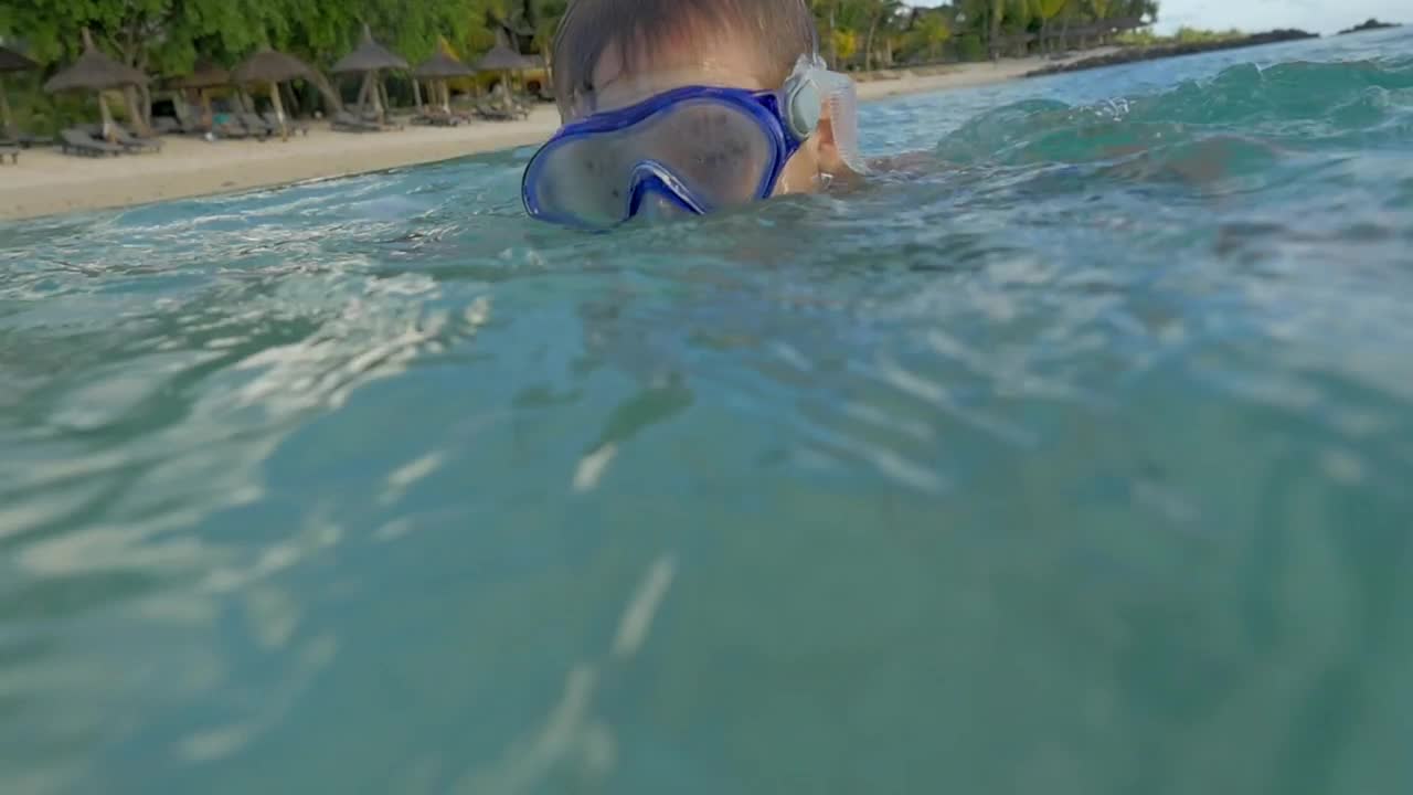Stock Video Boy Playing In The Ocean With A Mask Live Wallpaper For PC