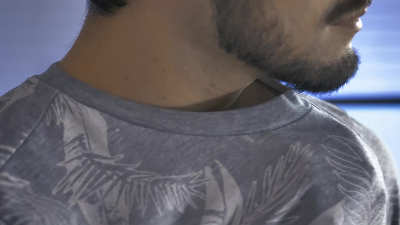 Stock Video Boy Placing A Lapel Microphone On His Shirt Live Wallpaper For PC