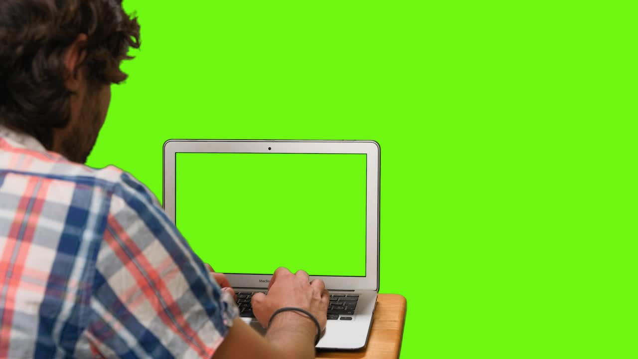 Stock Video Boy On His Computer With Green Screen On A Chroma Live Wallpaper For PC