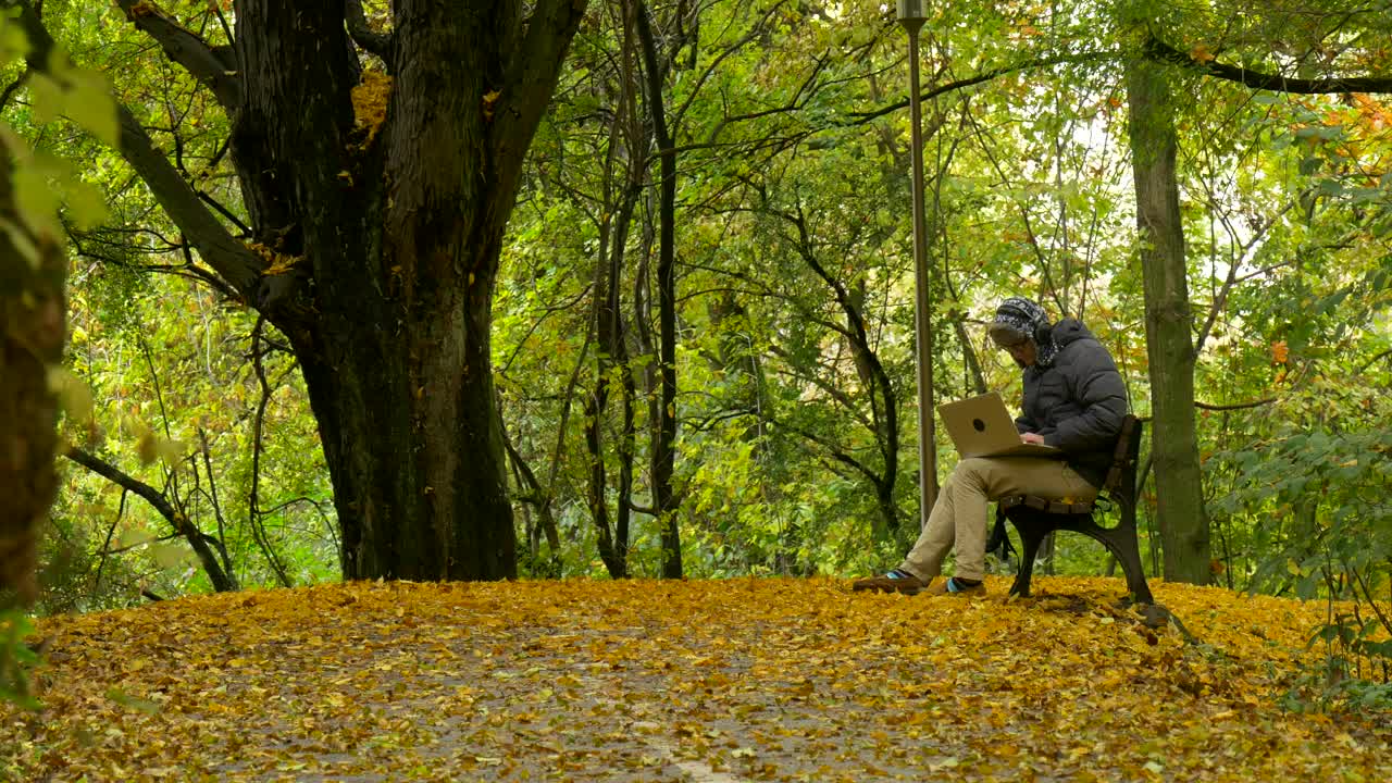 Stock Video Boy Keeps His Things And Retires In A Park In Live Wallpaper For PC