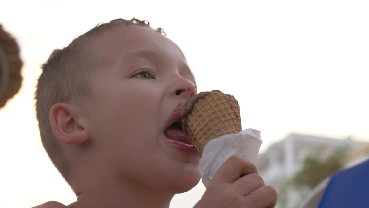 Stock Video Boy Enjoying A Chocolate Ice Cream Live Wallpaper For PC