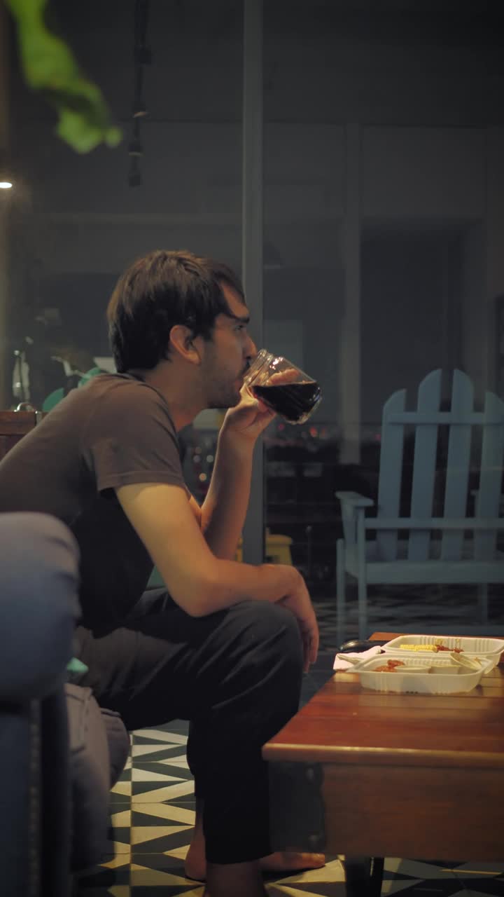 Stock Video Boy Eating On A Sofa While Watching Tv Live Wallpaper For PC