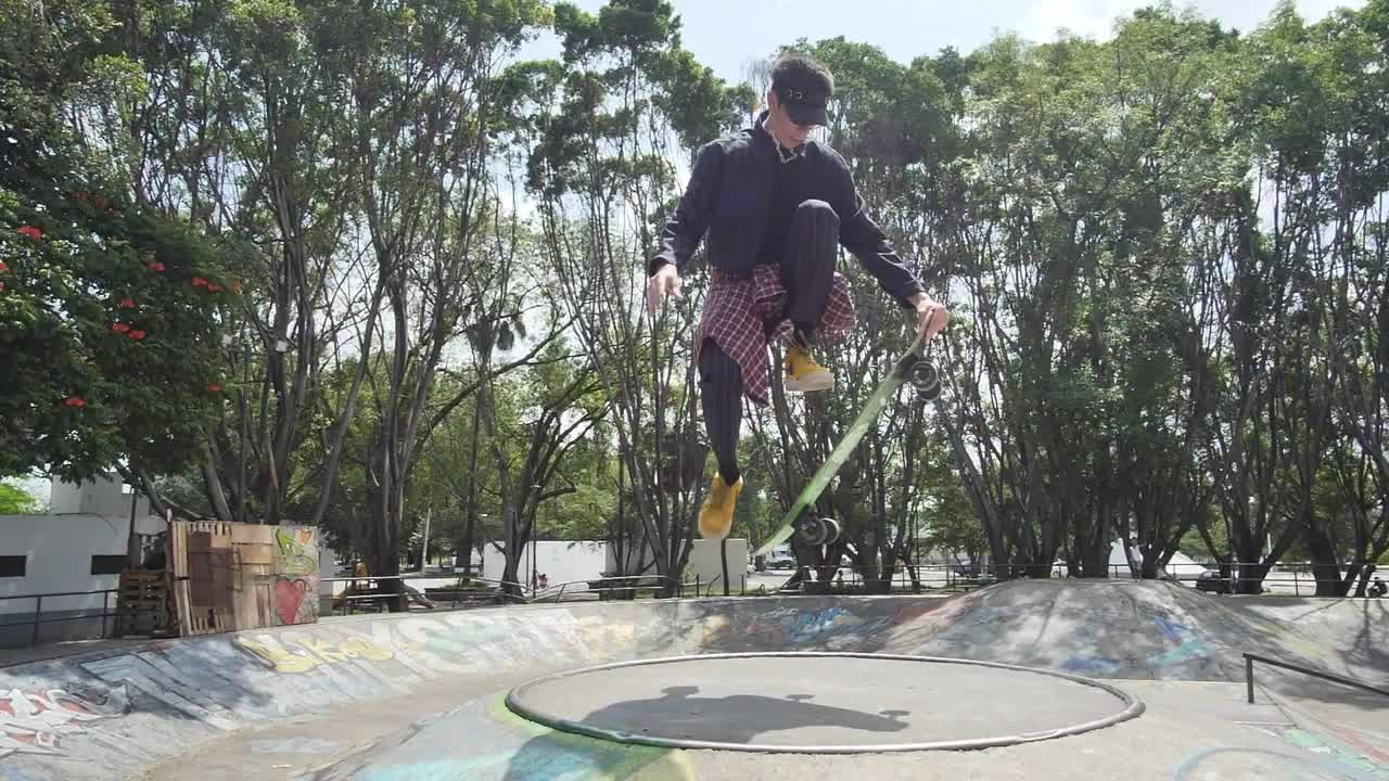 Stock Video Boy Doing A Pirouette With A Skateboard In A Park Live Wallpaper For PC