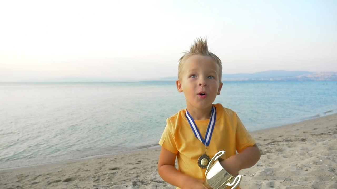 Stock Video Boy Celebrating With His Trophy Live Wallpaper For PC