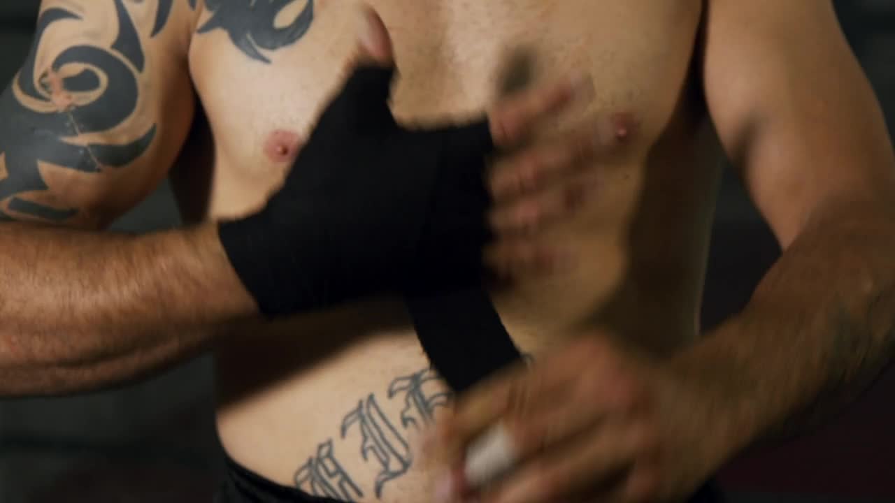 Stock Video Boxer Wrapping Their Hands In Black Fabric Live Wallpaper For PC