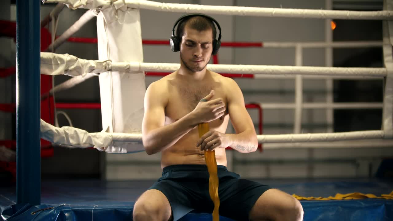 Stock Video Boxer Preparing For His Training Next To The Ring Live Wallpaper For PC