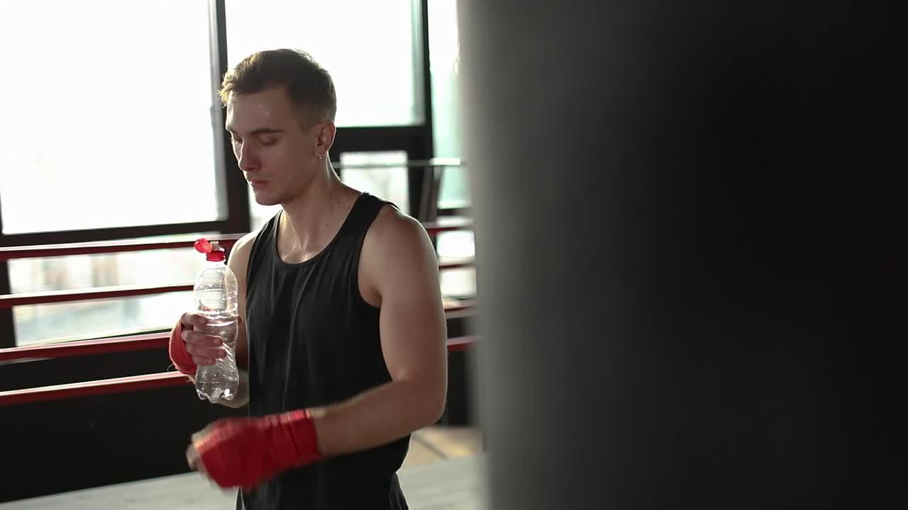 Stock Video Boxer Drinking Water After His Training Live Wallpaper For PC