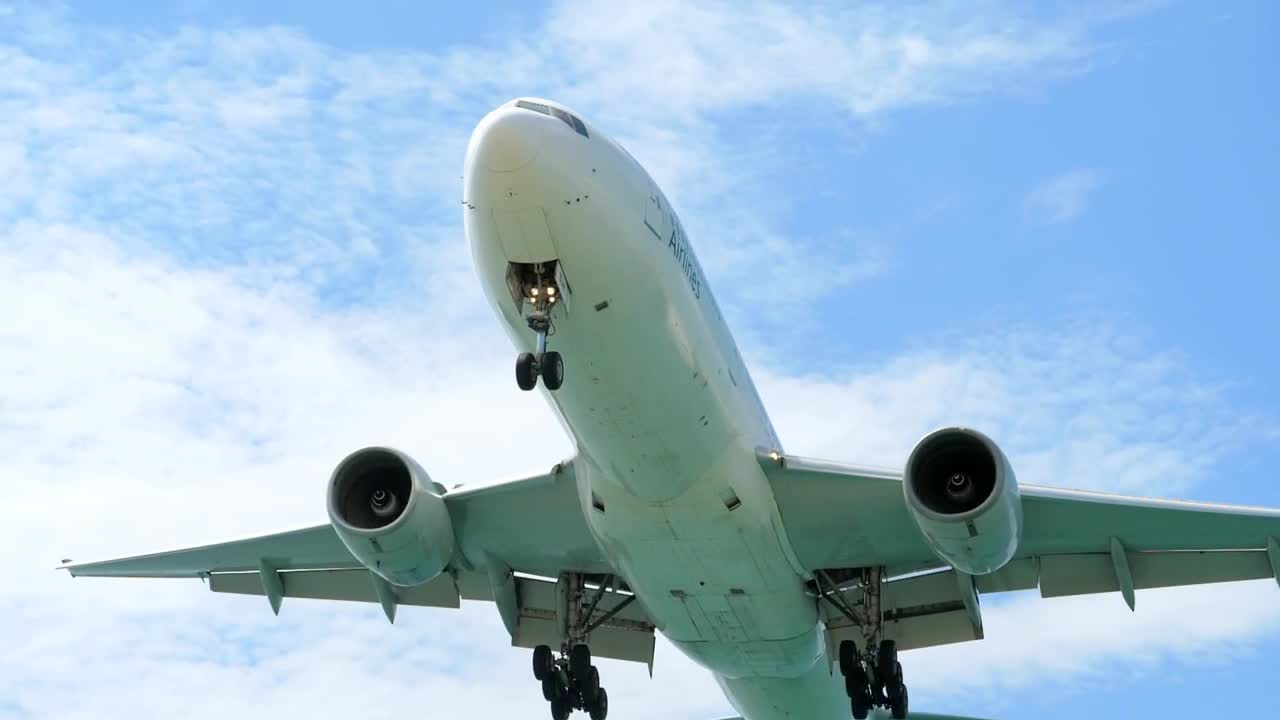 Stock Video Bottom View Of An Airplane Preparing To Land Live Wallpaper For PC