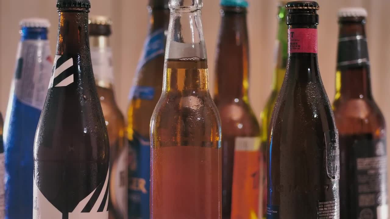 Stock Video Bottles Of Craft Beer From Different Brands Live Wallpaper For PC