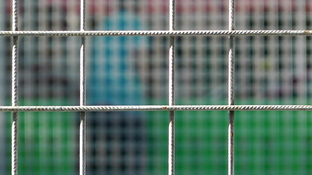 Stock Video Bored Or Tired Man Behind A Fence Live Wallpaper For PC