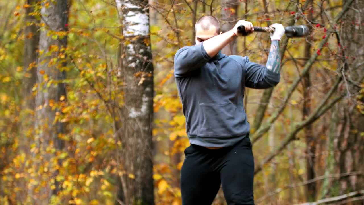 Stock Video Bodybuilder Hitting A Truck Tire With A Mallet Live Wallpaper For PC