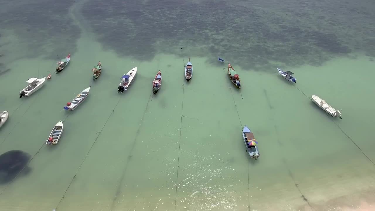 Stock Video Boats Tied Up Near A Paradisiacal Beach From Above Live Wallpaper For PC