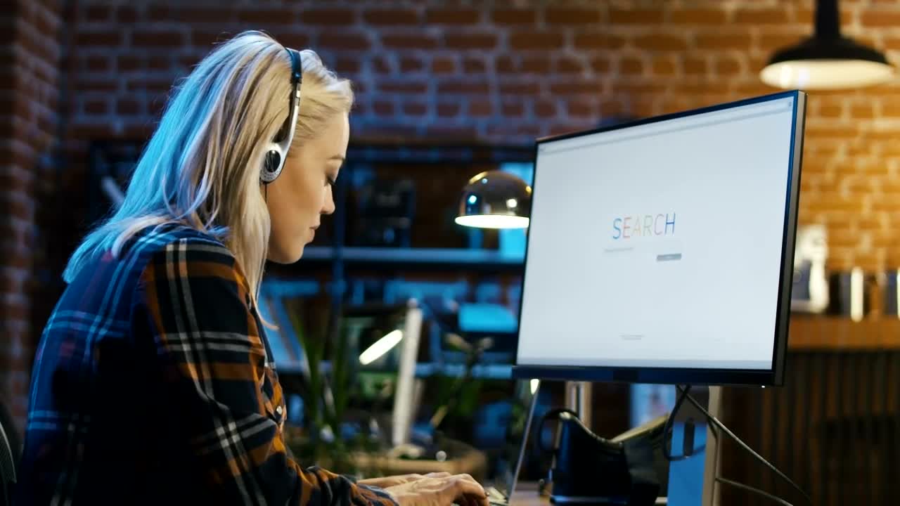 Stock Video Blonde Girl Surfing The Internet At The Office Live Wallpaper For PC