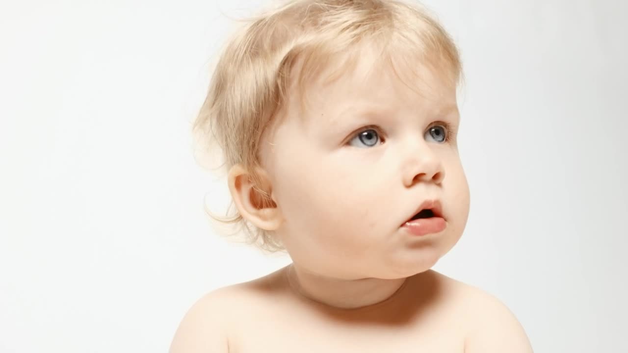 Stock Video Blonde Baby Face In A White Background Live Wallpaper For PC