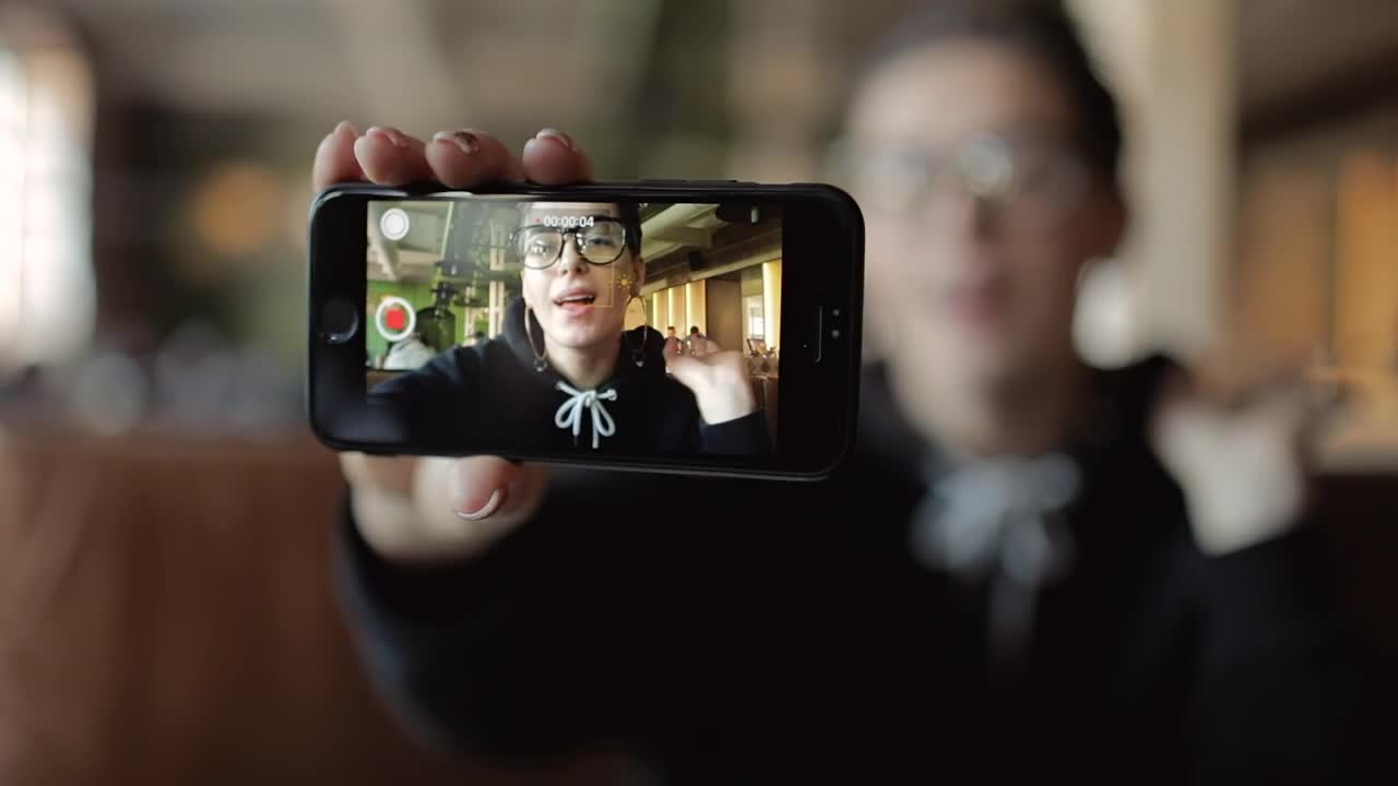 Stock Video Blogger Recording Himself With His Cell Phone Live Wallpaper For PC