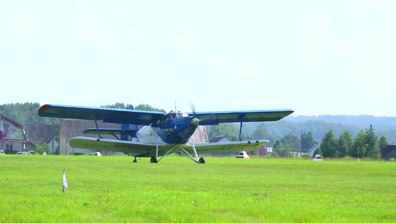 Stock Video Biplane Crossing The Grass Field Live Wallpaper For PC