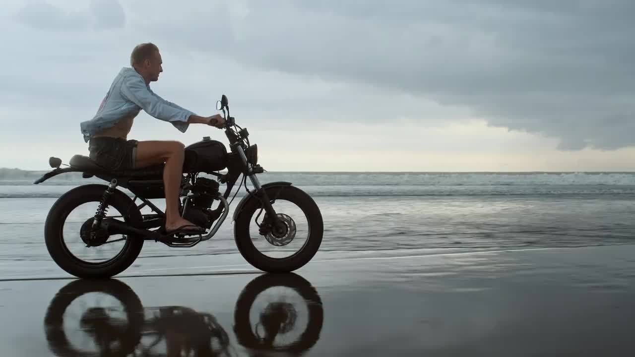 Stock Video Biker Riding On The Beach Live Wallpaper For PC