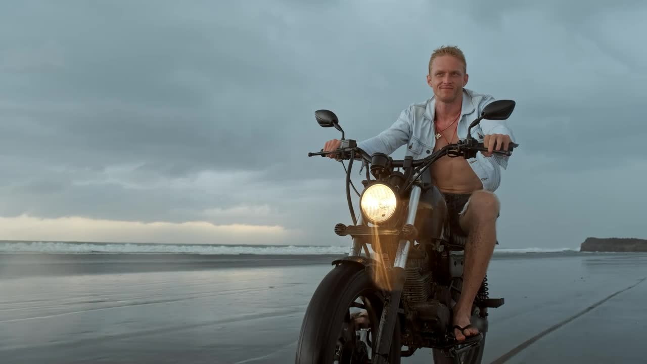 Stock Video Biker Riding His Motorcycle On The Beach Live Wallpaper For PC