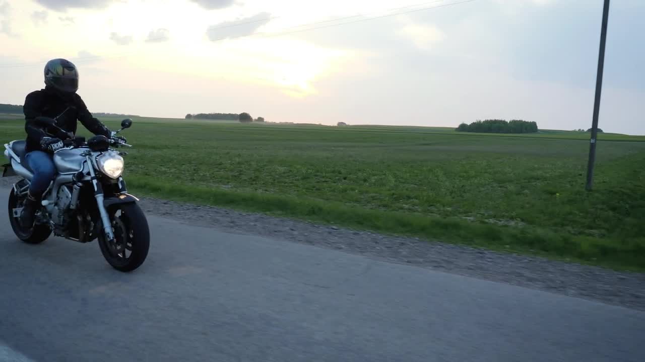 Stock Video Biker Driving On The Road In The Countryside Live Wallpaper For PC