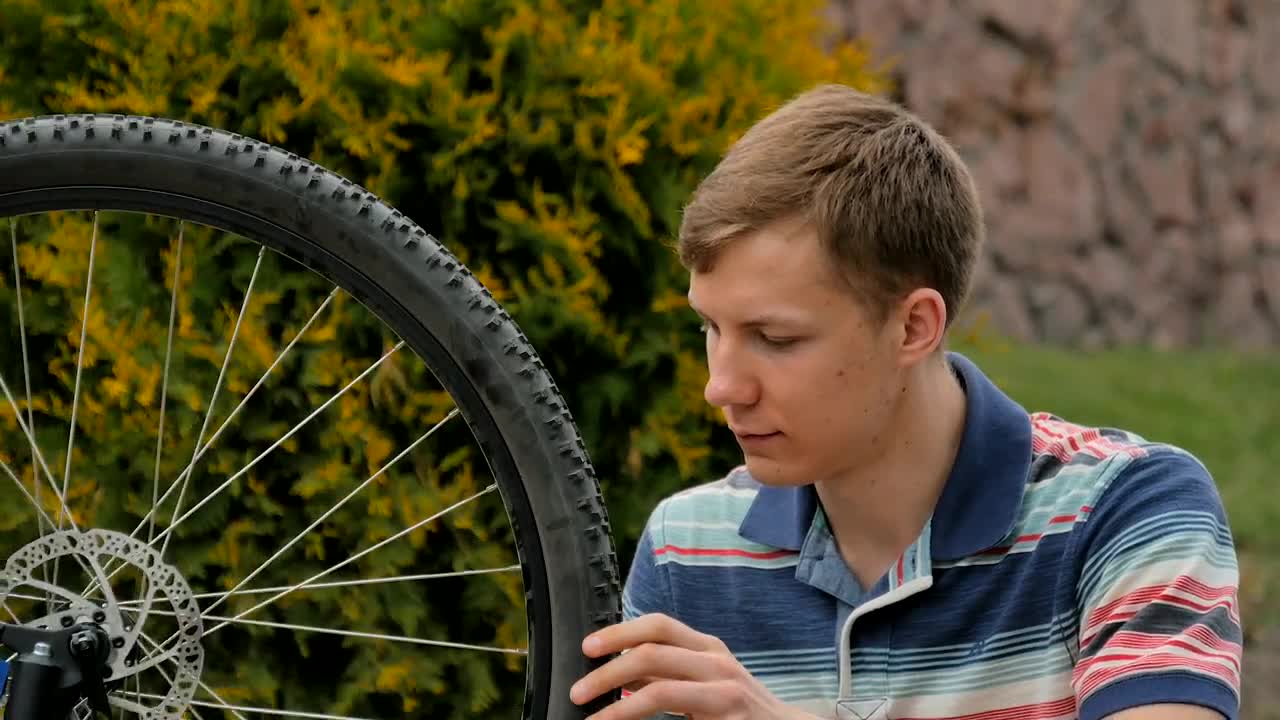 Stock Video Bike Repair Man Spins Wheel And Gives Ok Live Wallpaper For PC