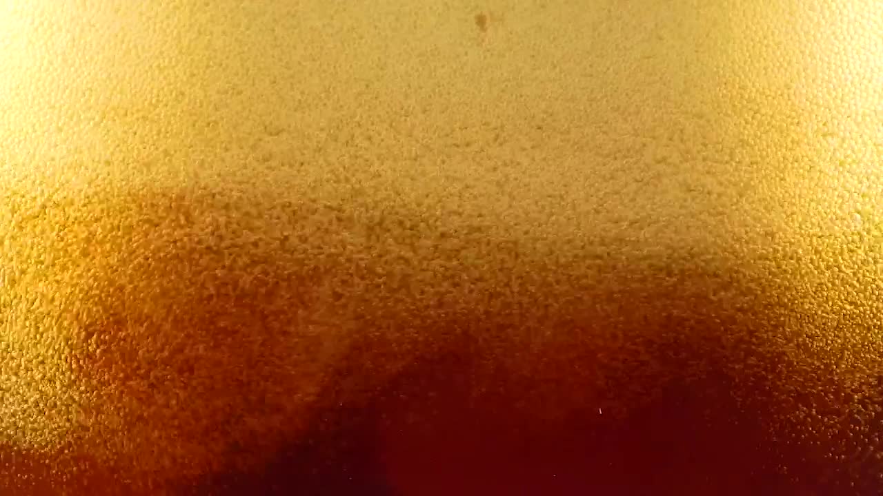 Stock Video Beer Foam Forming In A Glass Seen From Close Up Live Wallpaper For PC