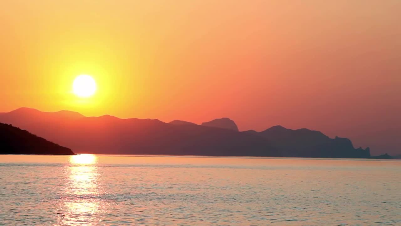 Stock Video Beautiful Sunset Reflected On The Sea Seen From The Beach Live Wallpaper For PC