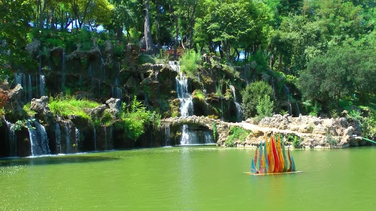 Stock Video Beautiful Lake And Its Waterfalls In A Park Live Wallpaper For PC
