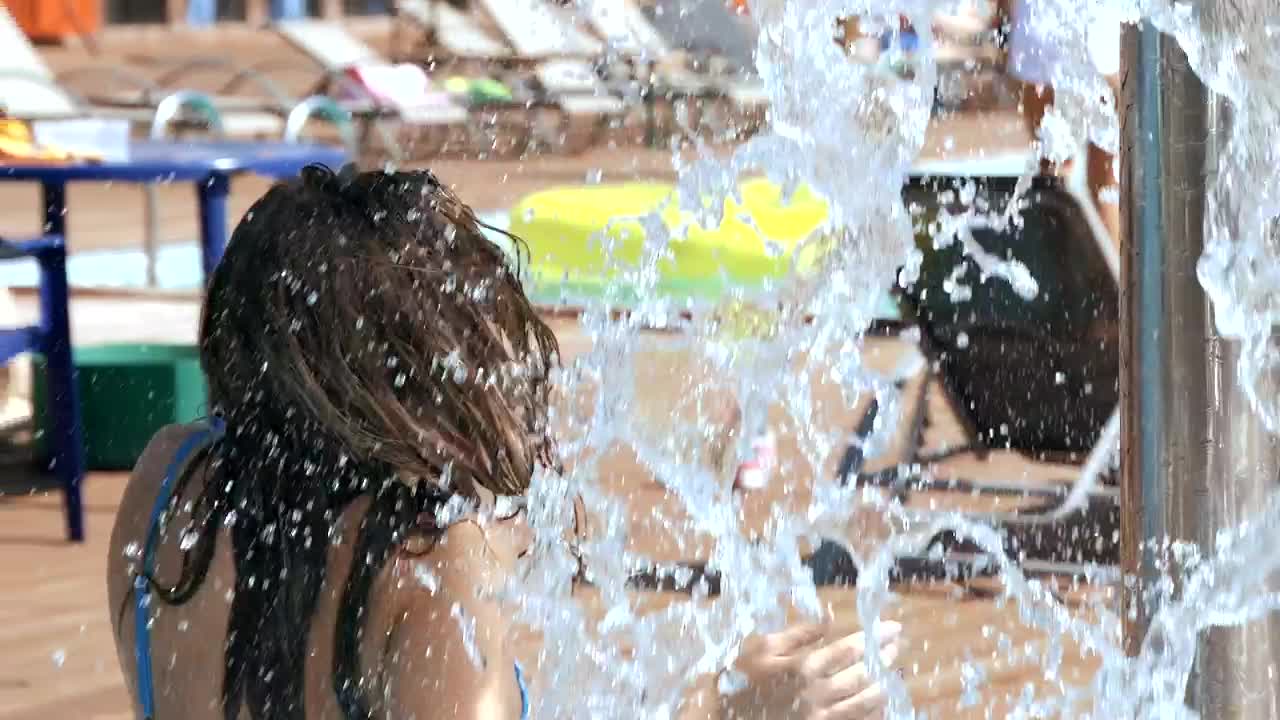 Stock Video Beautiful Girl In Bikini Splashed With Water At Resort Live Wallpaper For PC