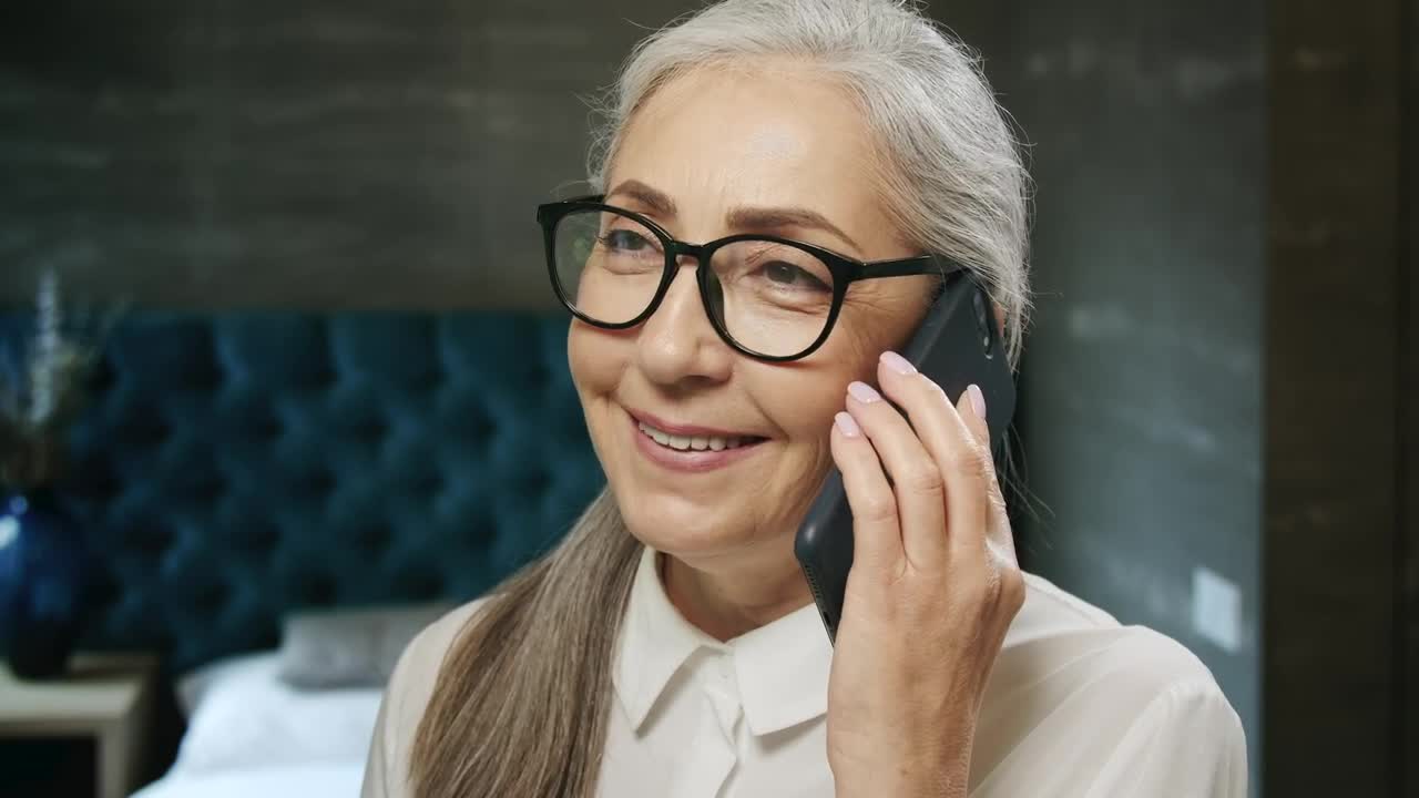 Stock Video Beautiful Elderly Woman Chats On Mobile Phone Live Wallpaper For PC