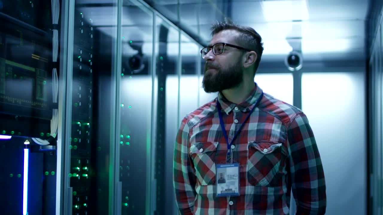 Stock Video Bearded Man In Server Room Live Wallpaper For PC